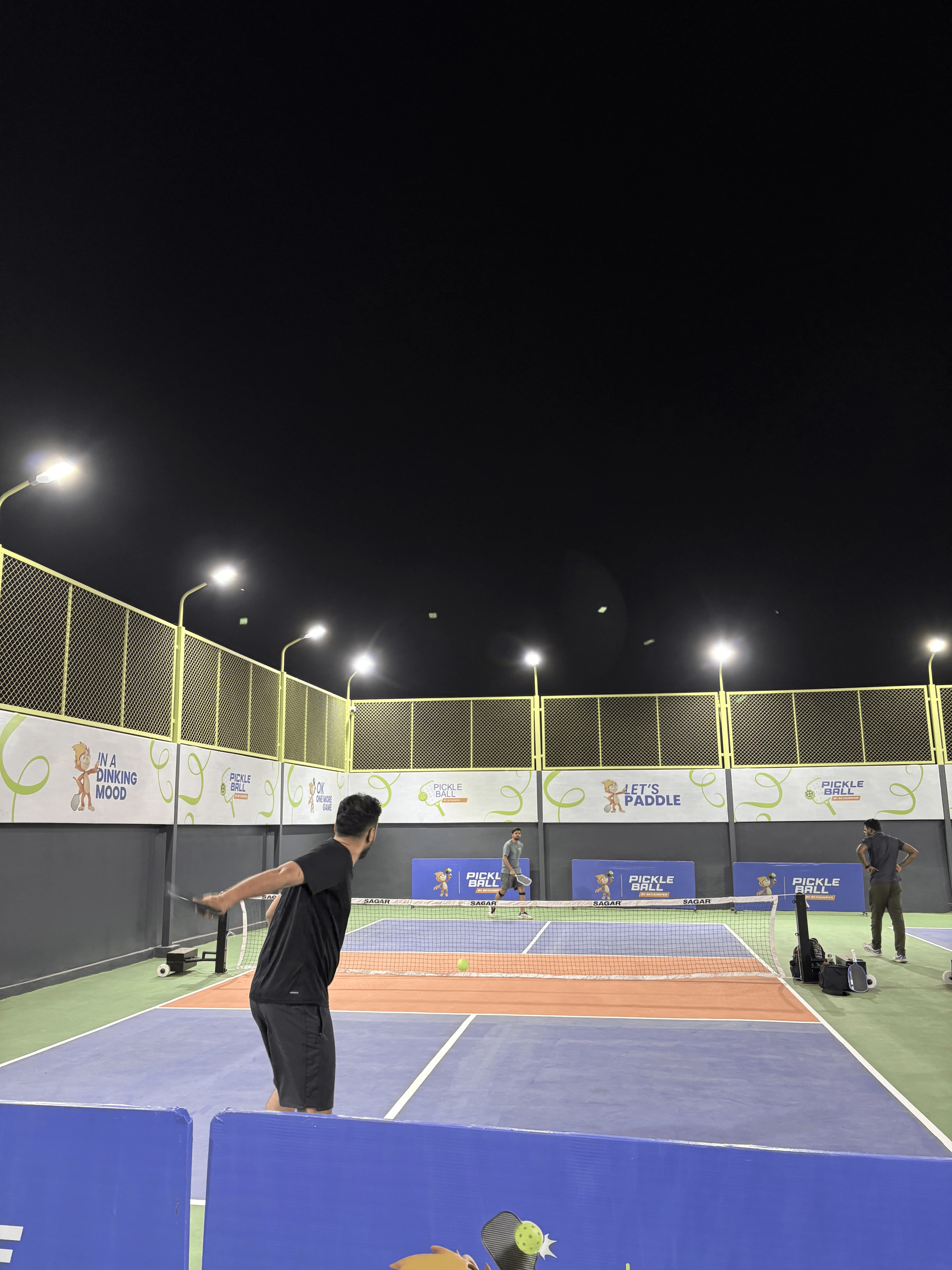 Players At Pickle Ball By SkyJumper Players At Pickle Ball By SkyJumper